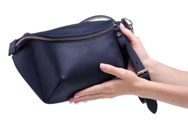 Black leather waist bag in hand — Stock Photo, Image