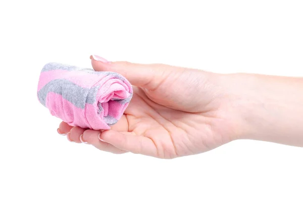 Roze sokken in de hand — Stockfoto