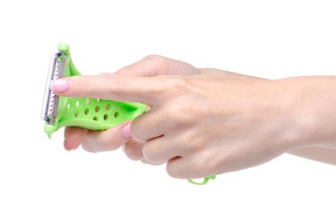 Eldeki sebzeler için soyucu