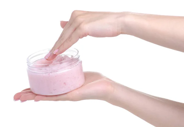 Frasco de exfoliante rosa para el cuerpo en la mano — Foto de Stock