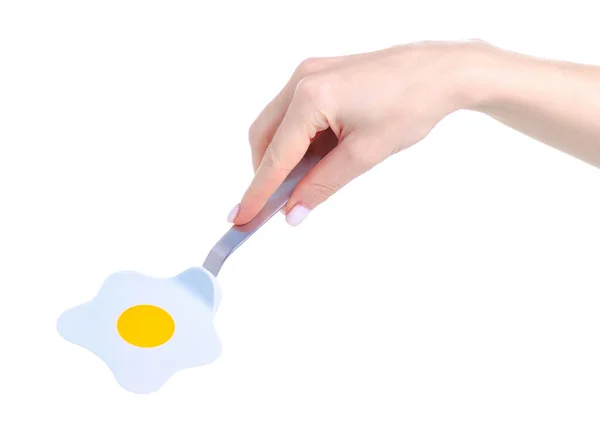 Konyhai spatula alakú tojás a kézben — Stock Fotó