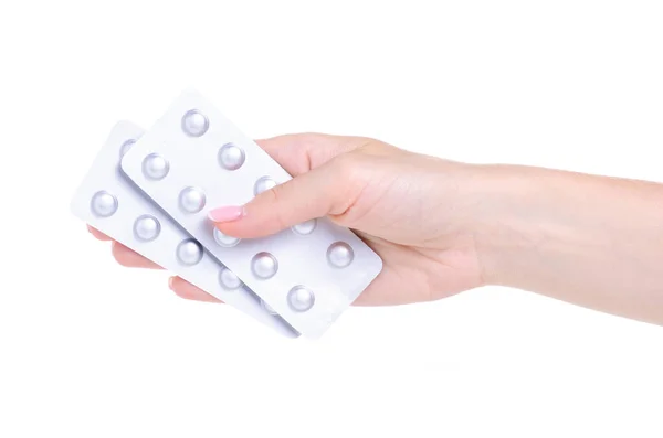 Plaquette thermoformée de pilules médicament pharmacie en main — Photo