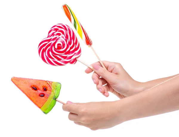 Snoep lolly kleurrijk in de hand — Stockfoto