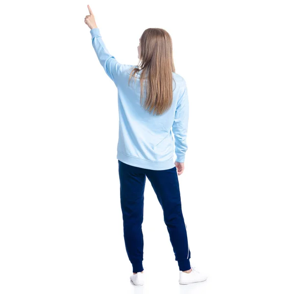 Mulher em azul sweatpants esporte estilo casual de pé olhando mostrando apontando — Fotografia de Stock