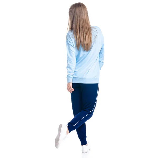 Donna in pantaloni della tuta blu stile sportivo casual va a piedi — Foto Stock