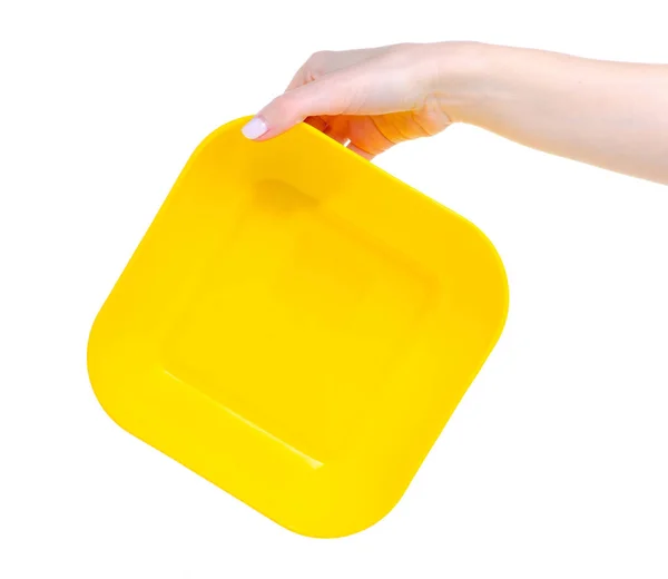 Cuenco de cocina de plástico amarillo en mano —  Fotos de Stock