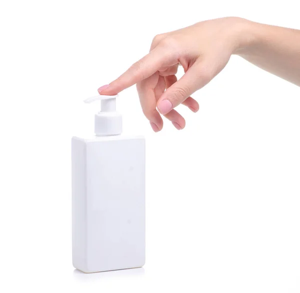 Белое мыло с дозатором в руке — стоковое фото