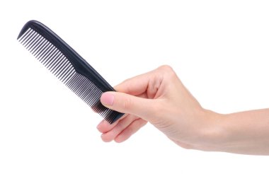 Elinde siyah saç tarağı