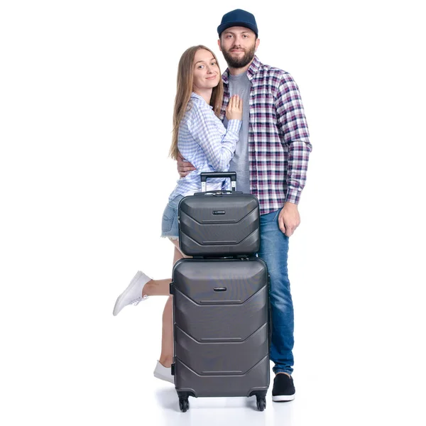 Счастливая пара туристов с черным чемоданом багаж улыбается — стоковое фото