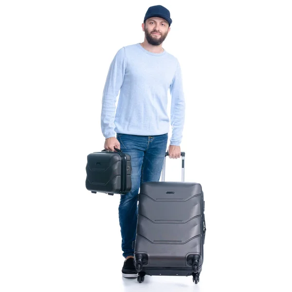 Homme en jeans avec valise de voyage debout — Photo