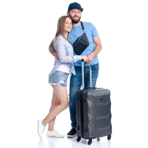 Casal feliz de turistas com malas pretas luggages sorrindo — Fotografia de Stock