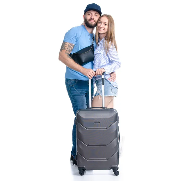 Felice coppia di turisti con valigia nera bagagli sorridenti — Foto Stock