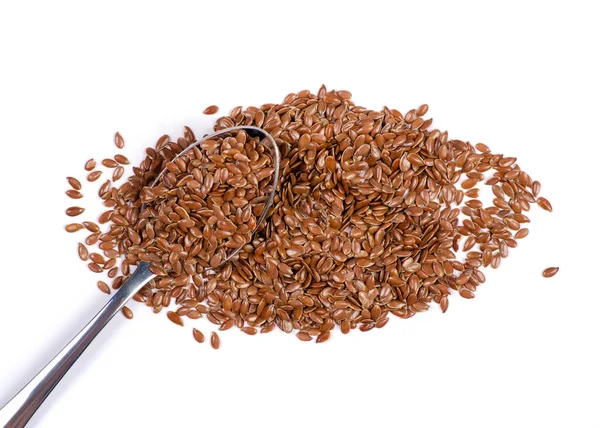 Flax seeds in spoon — Stock Photo, Image