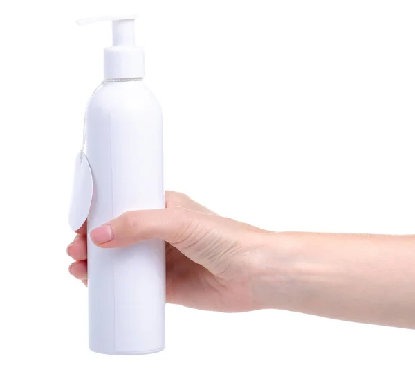 Botella blanca con dispensador de producto de belleza en la mano — Foto de Stock