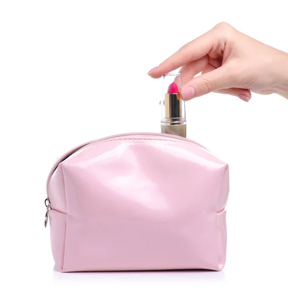 Pink lipstick in hand put in cosmetic bag beauty — Stock Photo, Image