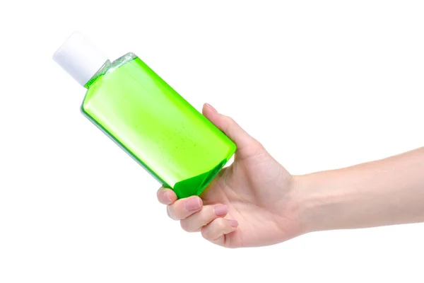 Lavagem bucal verde cuidados dentários na mão — Fotografia de Stock