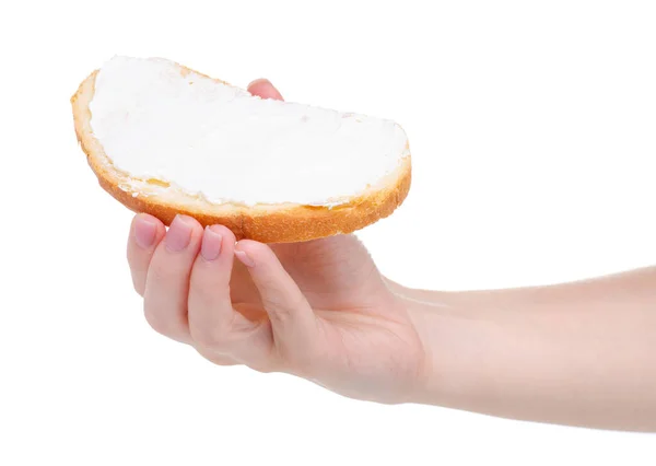 Chleb z serem śmietankowym przetworzonym w dłoni — Zdjęcie stockowe