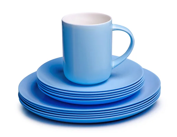Пастельно-голубые тарелки и чашка — стоковое фото