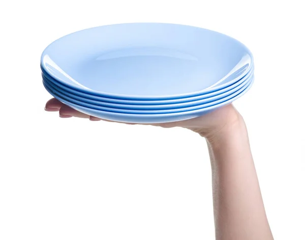 손에 들고 있는 파종 된 파란 접시들 — 스톡 사진