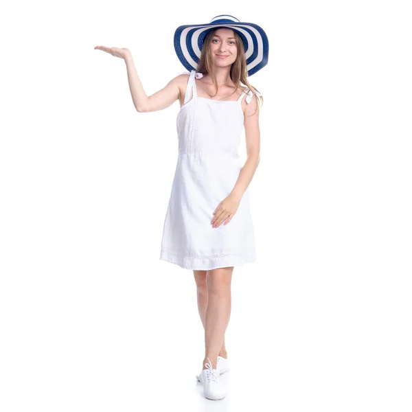 Woman in dress and summer hat smiling happiness standing pointing showing — Stock Photo, Image