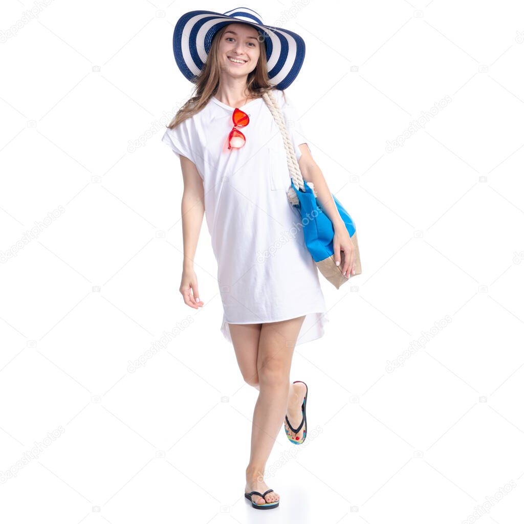 Woman in sun hat, sunglasses and beach bag summer smiling happiness looking walking goes