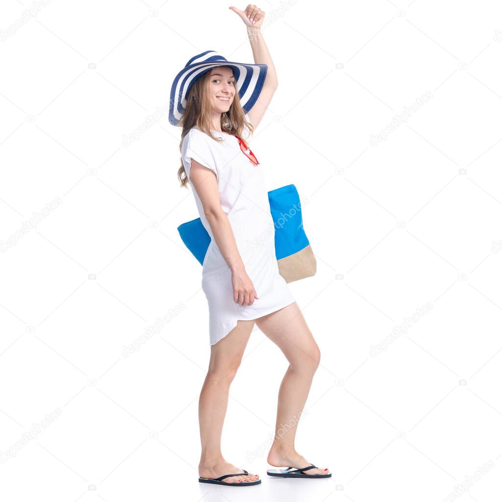 Woman in sun hat, sunglasses and beach bag summer smiling happiness looking showing pointing