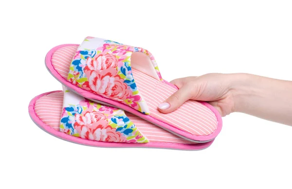 Female pink slippers in hand — Stock Photo, Image