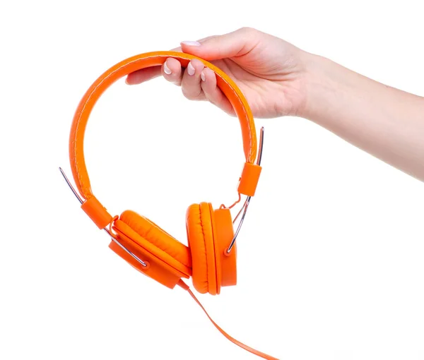 Orangefarbene Kopfhörer klingen in der Hand — Stockfoto
