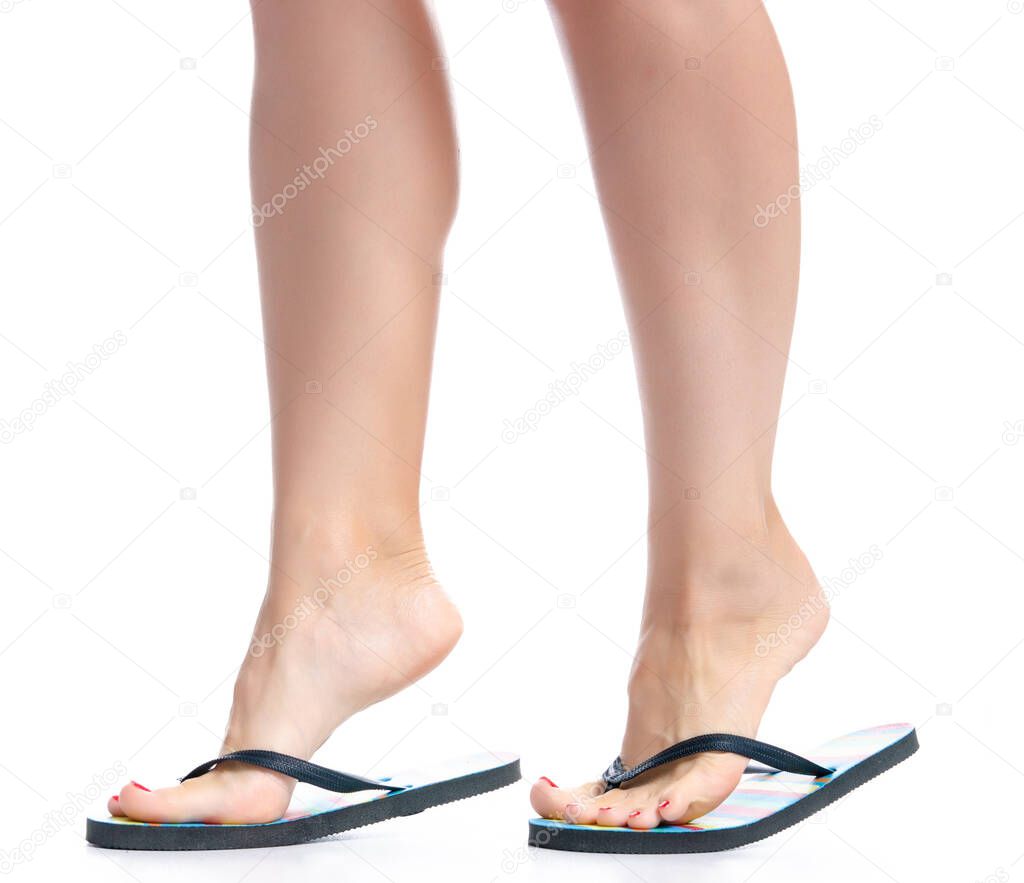 Female legs with flip flops