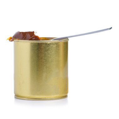 Yoğunlaştırılmış sütlü kavanoz ve kaşık