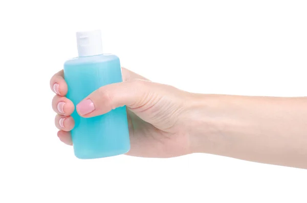 Bottle acetone nail polish remover in hand — Stock Photo, Image