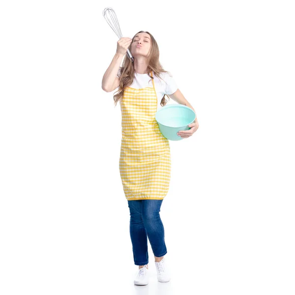 Donna in grembiule blu con ciotola da cucina frusta corolla in mano — Foto Stock
