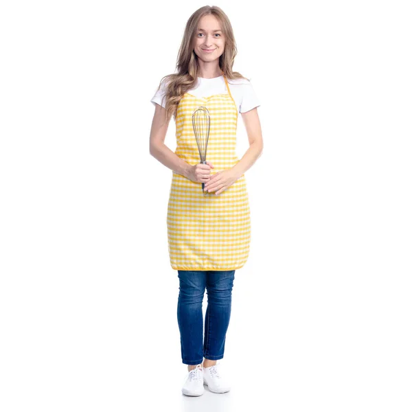 Frau in gelber Schürze mit Küchenbesen-Krone in der Hand — Stockfoto