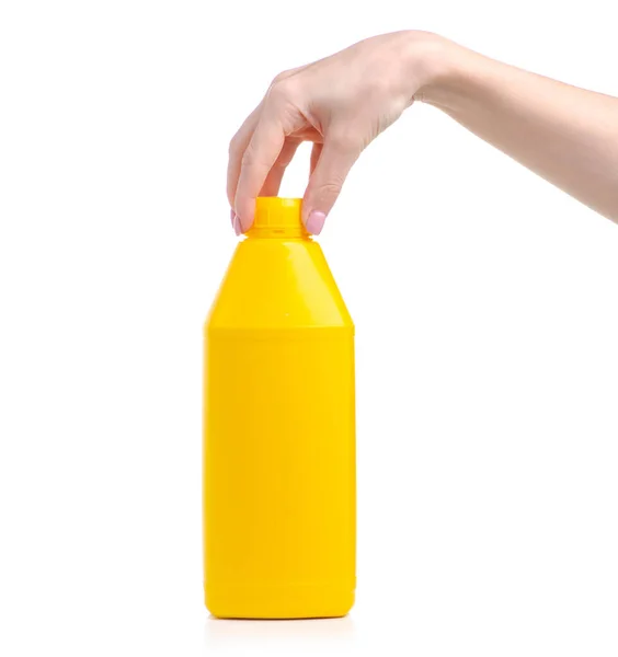 Yellow bottle industrial primer in hand — Stock Photo, Image