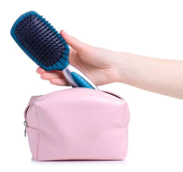 ピンクの化粧品袋に入れ青い髪のブラシ — ストック写真
