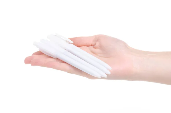 Белые ручки в руке — стоковое фото