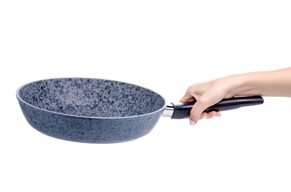 Pan i handen matlagning mat — Stockfoto