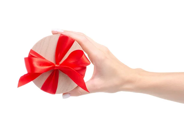 Caja con lazo rojo regalo de lazo en mano —  Fotos de Stock