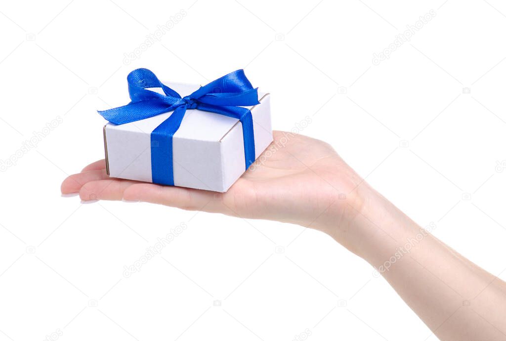 White box with blue ribbon bow gift in hand