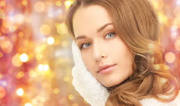 Close up of beautiful woman in mittens — Stock Photo, Image