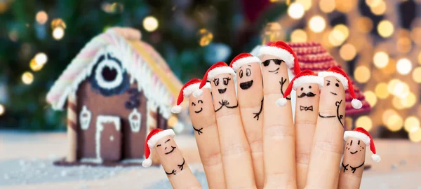 Close up of hands and fingers with smiley faces — Stock Photo, Image