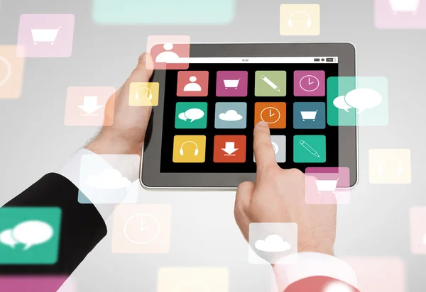 Close up of hands holding tablet pc with app icons — Stock Photo, Image