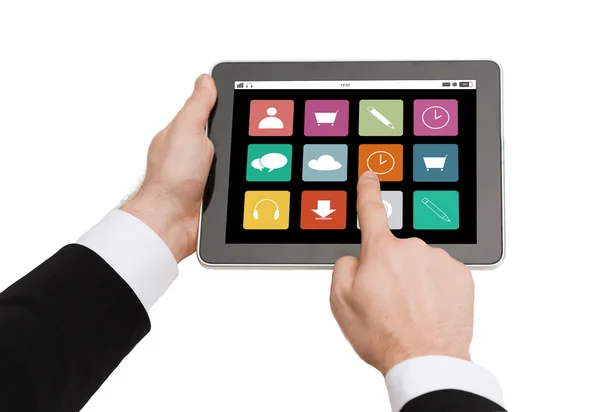 Primer plano de las manos de la tableta de la PC con iconos de aplicaciones Imágenes de stock libres de derechos