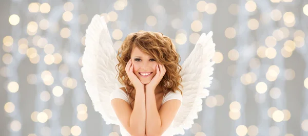 Happy young woman or teen girl with angel wings — Stock Photo, Image