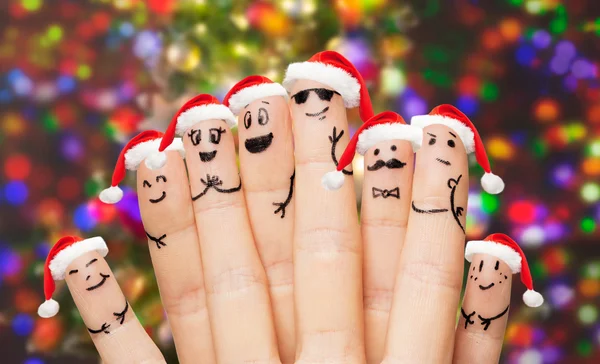 Close up of hands and fingers with smiley faces — Stock Photo, Image