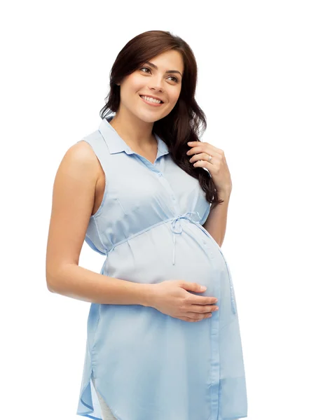 Happy těhotná žena dotýká její velké břicho — Stock fotografie