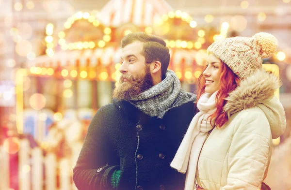 Happy couple walking in old town — Stock Photo, Image