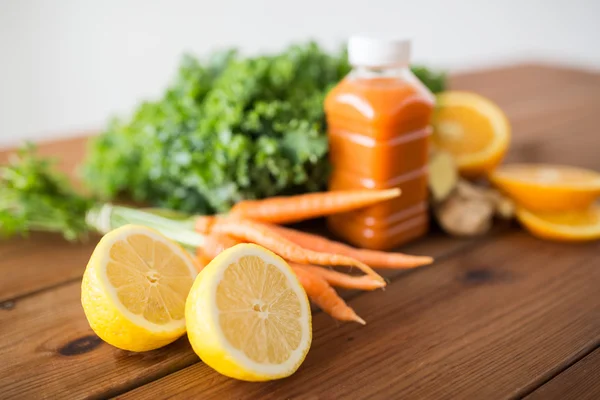 Lemon with carrot juice, fruits and vegetables — Stock Photo, Image