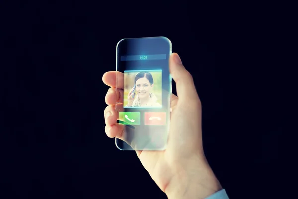 Nahaufnahme der männlichen Hand mit transparentem Smartphone — Stockfoto