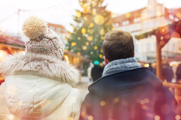 Close up of couple in old town at christmas — Stock Photo, Image